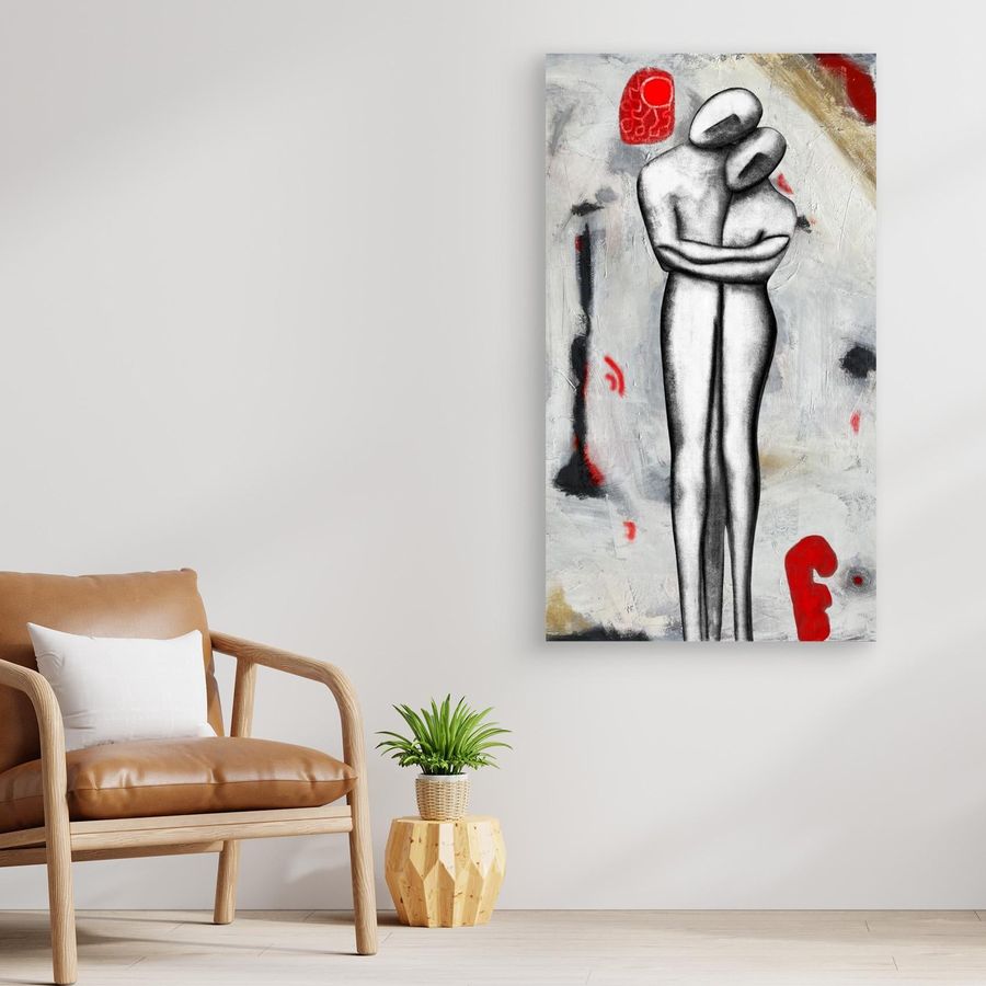 Room mockup: Solida Coesione 45 × 80 cm canvas print on a light-grey wall beside an armchair, evening neutral light, soft cast shadow. Unframed canvas print, true 9:16 proportion.